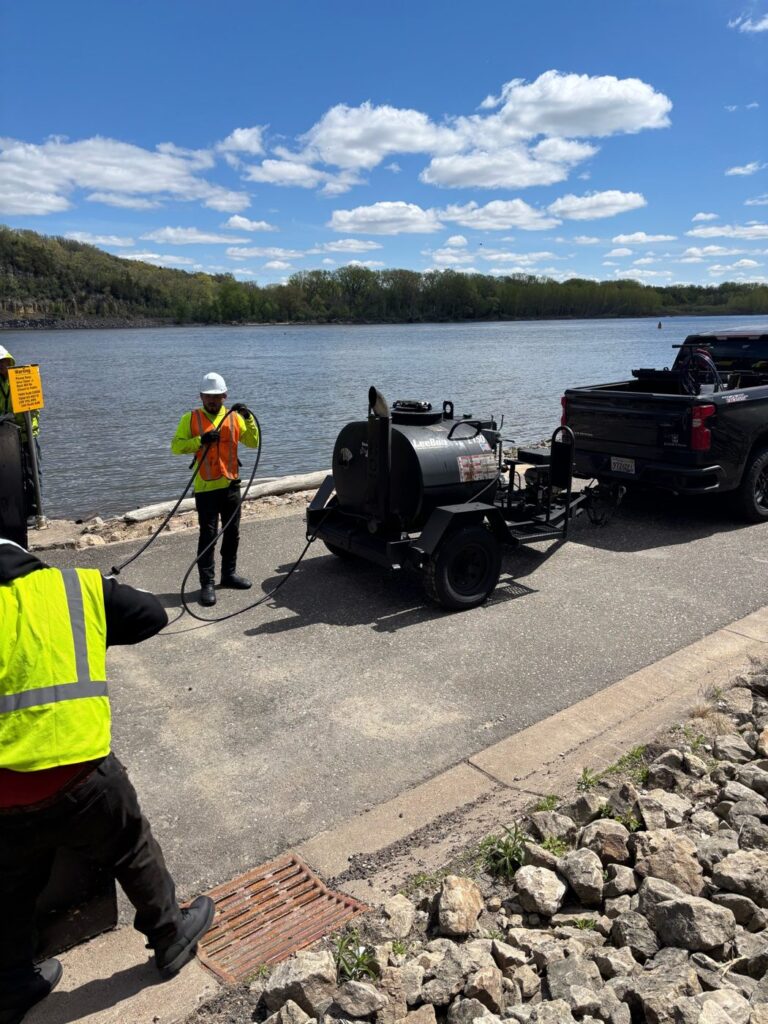 Perfect Path Pavers sealcoating trailer and crew